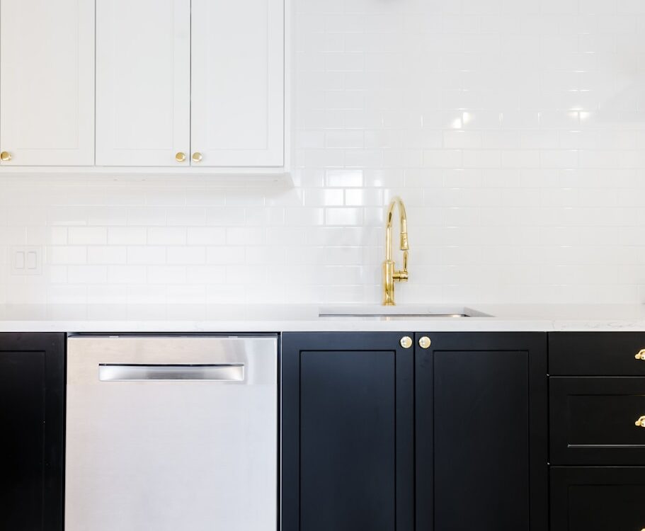 white wooden cabinet beside white wall